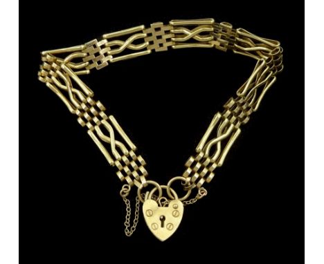 9ct gold fancy four bar gate bracelet, with heart locket clasp, hallmarkedCondition Report:Approx 8.9gm, length = 18cm