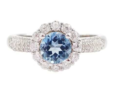 Silver blue topaz and cubic zirconia cluster ring, stamped 925Condition Report:Size Q-R, good condition