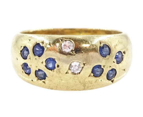 9ct gold rubover set sapphire and diamond ring, London 1988 Condition Report:Approx 3.6gm, size H, max depth = 7.7mm, some ru