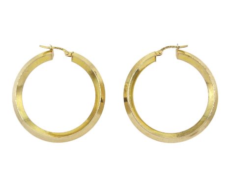 Pair of 9ct gold hoop earrings, hallmarkedCondition Report:Approx 4gm, diameter = 37mm, few light scratches otherwise good co