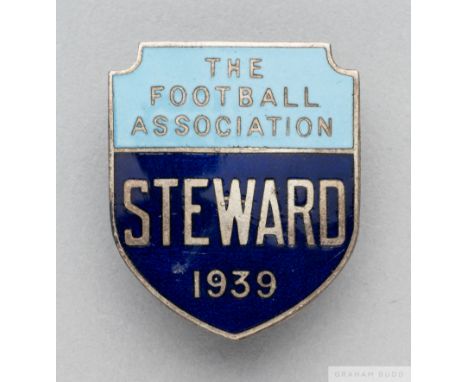 A gilt-metal and enamel 1939 F.A. Cup Steward's badge the obverse inscribed THE FOOTBALL ASSOCIATION STEWARD 1939 with brooch