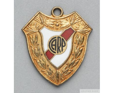 Alfredo Di Stefano gilt-metal and enamel River Plate Champions medal, 1948 the obverse inscribed CARP, the reverse inscribed 