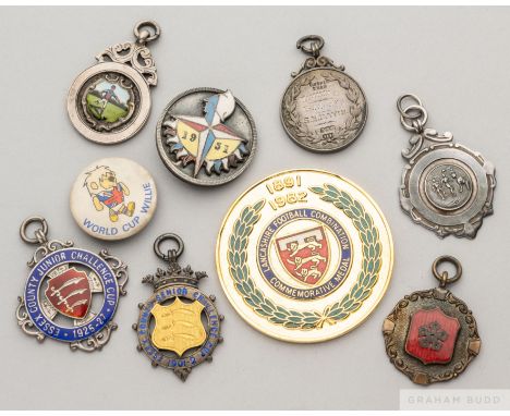 Five silver and enamel football medals including Football Express Cup, 1922-23, Essex County Junior Challenge Cup, 1926-27, E