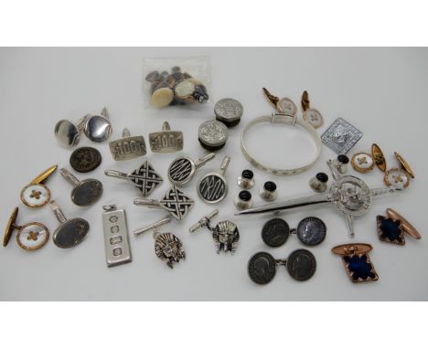 A silver bangle, a collection of silver and costume jewellery cufflinks etc Condition Report: Not available for this lot