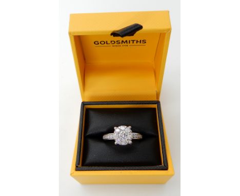 An 18ct white gold Goldsmiths diamond cluster ring set with estimated approx 1ct of brilliant cut diamonds, finger size N, we