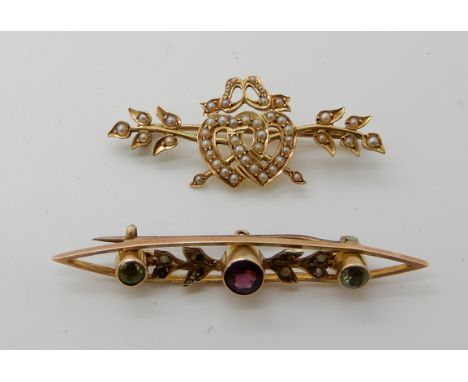 A bright yellow metal pearl set brooch with double heart motif and a 9ct gold peridot and garnet brooch, combined weight 6.7g