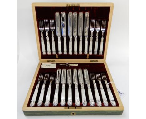 A cased twenty four piece EP and mother of pearl dessert cutlery set Condition Report: Available upon request