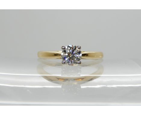 An 18ct gold solitaire hearts and arrows cut diamond ring of estimated approx 0.43cts, with a IGI diamond certificate which s