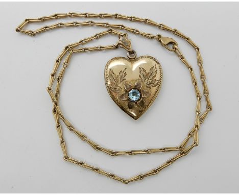A 9ct gold fancy neck chain with a gold plated heart shaped locket, length of the chain 45cm, weight of the chain only 7.5gms