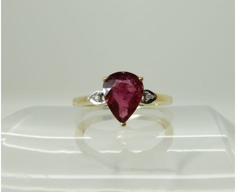 A 9ct gold pink tourmaline and diamond accent ring, size O, weight 2.3gms Condition Report: Available upon request