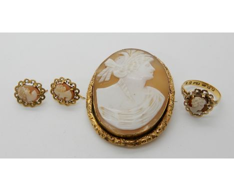 A 9ct gold mounted shell cameo brooch, together with an 18ct gold cameo ring, (head in 9ct) with matching earrings Condition 