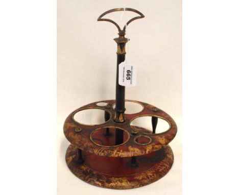 A Toleware decanter stand, the red ground with gilt decoration Condition Report: some losses to decoration. 