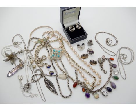 A collection of silver and costume jewellery to include bangle, chains earrings etc Condition Report: Not available for this 