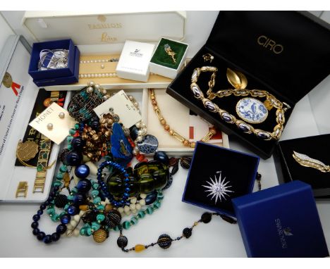 A large collection of costume jewellery to include Swarovski, Monet, Murano glass beads, Ciro, Marcel Drucker etc (The leadin