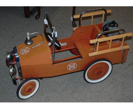 A Great Gizmos Ltd child's toy pedal truck, 94cm wide Condition Report: Available upon request