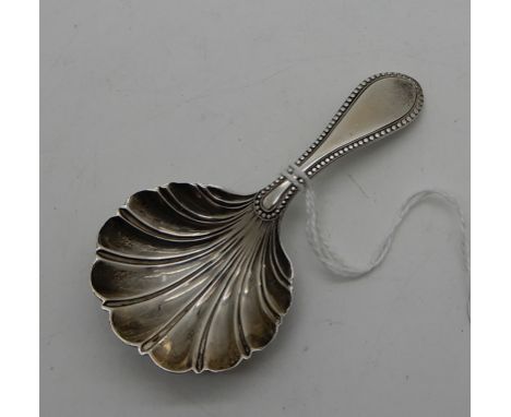 A silver caddy spoon with shell shaped bowl, Sheffield 1940, 8cm long Condition Report: Good condition. .