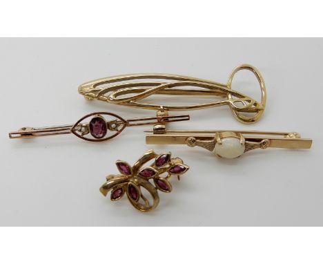 A 9ct gold Mackintosh style brooch, a 9ct ruby set brooch, a 9ct opal brooch and a yellow metal garnet and pearl brooch, comb