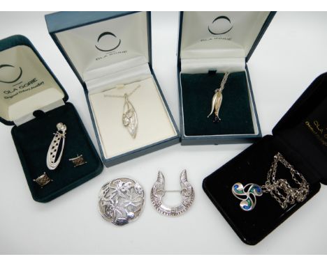 A silver Ola Gorie pike brooch, other items by Ola Gorie and a silver Celtic chasing hounds brooch by another maker etc Condi