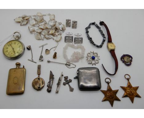 A lot comprising WWII France and Germany star, Atlantic star, a military pocket watch, a silver vesta and some costume jewell