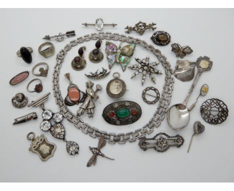 Two silver sweetheart rings, vintage silver brooches etc Condition Report: Not available for this lot
