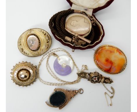 A Victorian balloon brooch set with a rose cut diamond, a 9ct gold pearl and gem set brooch, yellow metal mounted carnelian b