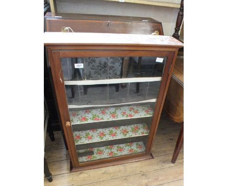 A floor standing multi compartment and shelf shop display cabinet