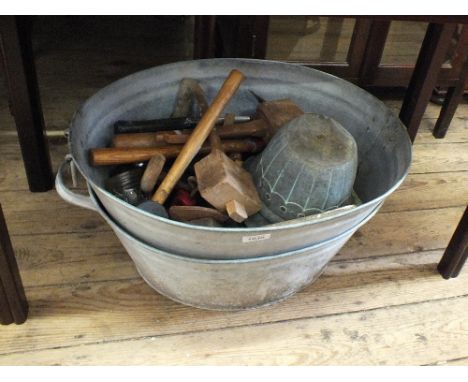 Two galvanised tubs containing tools etc