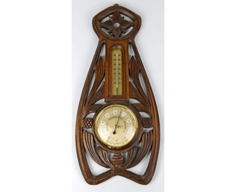 Jugendstil-Barometer, geschwungener, vegetabiler Holzrahmen mit Thermometer (intakt) und Barometer.Stuttgart um 1900.Höhe 45 