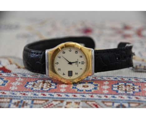 Junghans Mega Armbanduhr, Funkuhr.Weißes Ziffernblatt mit arabischen Ziffern. Datumsangabe / 3. Durchmesser Ziffernblatt um 2