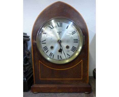 An early 20th Century German inlaid mahogany mantel clock