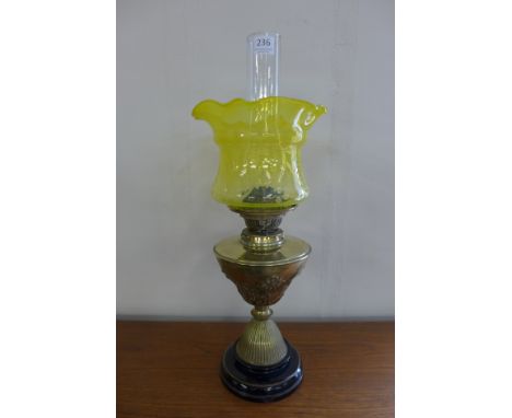 A Victorian brass oil lamp