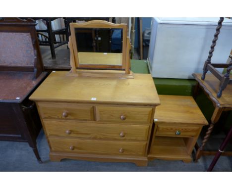 An Ercol pine dressing chest and bedside chest