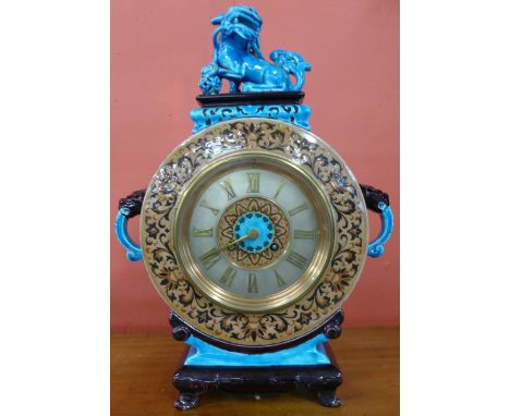 A French Jules Vieillard Bordeaux Aesthetic Movement clock, the turquoise case in Chinese taste surmounted with temple dog of