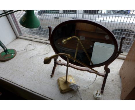 A mahogany toilet mirror and brass lamp