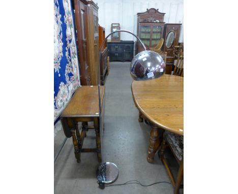 A chrome standard lamp