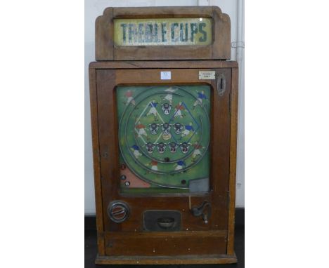 A vintage one penny coin operated Treble Cups pub game