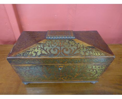 A Regency rosewood and brass inlaid sarcophagus shaped tea caddy