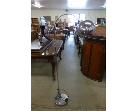 A chrome standard lamp