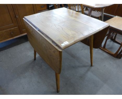 An Ercol drop leaf table