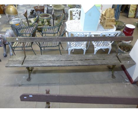 A cast iron cantilever railway platform bench