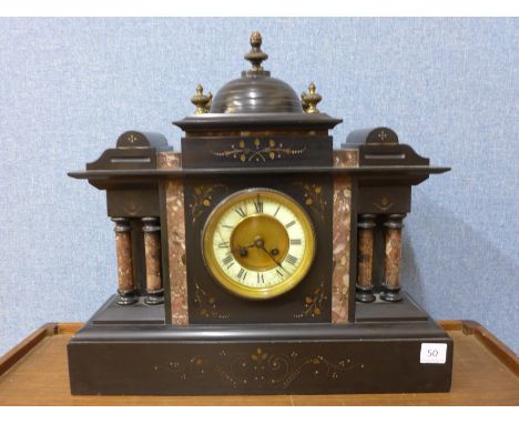 A 19th Century French Belge noir mantel clock, the movement signed G&B, Paris