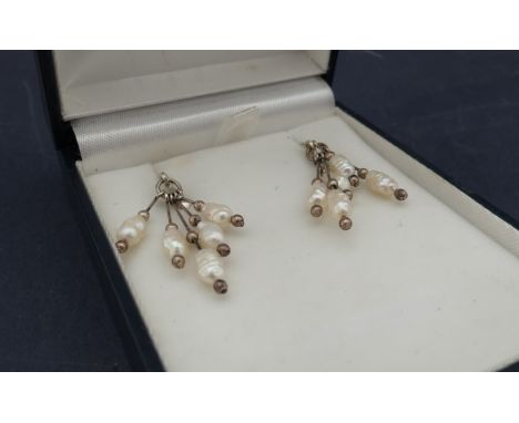 A pair of silver and rive pearl drop earrings 