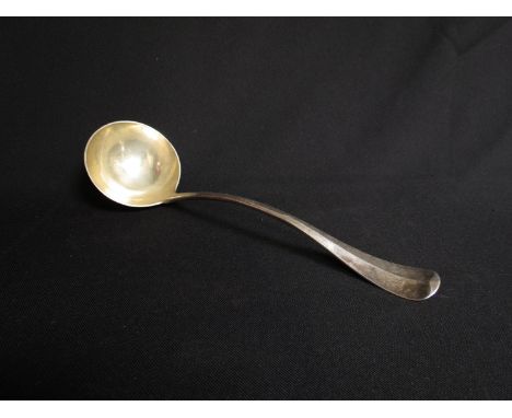 A George Jackson & David Fullerton Josiah Williams & Co silver soup ladle, London 1902, rat tail terminal with crest and mott