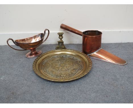 A brass tray, copper ale warmer, twin handle bowl and a brass candlestick (4) 