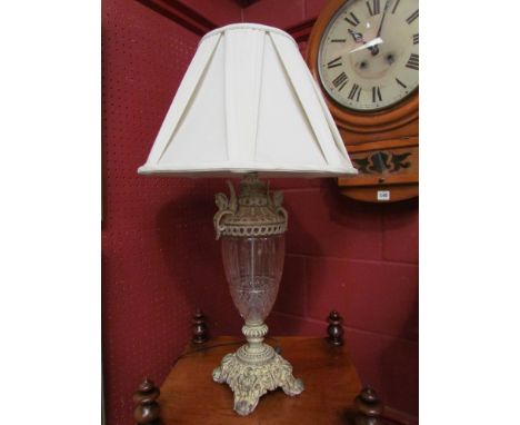 A French style table lamp with winged angel detail, glass body.  80cm tall 