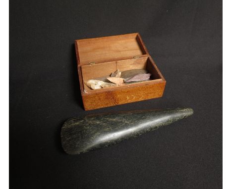A collection of Maurafanian Neolithic arrow heads spear points and clefs and a large polished trench axe head (blade re-polis