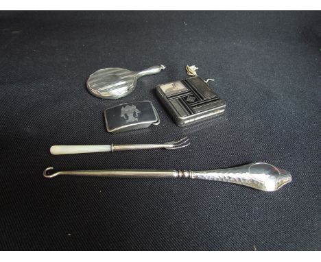 A Sterling silver belt buckle, silver miniature mirror, mother of pearl and silver pickle forks and powder compact