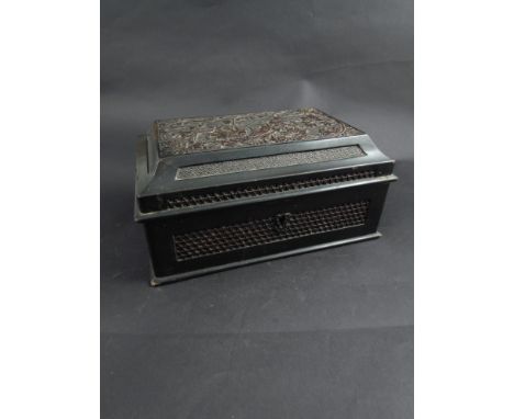 A late 19th Century Japanese lacquered tea caddy with pagoda top carved with panel of birds and foliage.  The lid opening to 