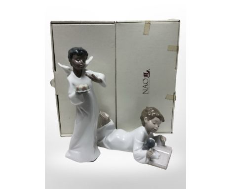 Two Nao figures of boys, No. 1285 and 1383, both with original boxes.