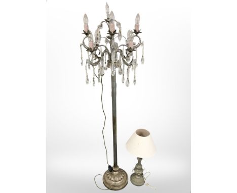 A silvered metal standard lamp in the form of a chandelier and a table lamp 